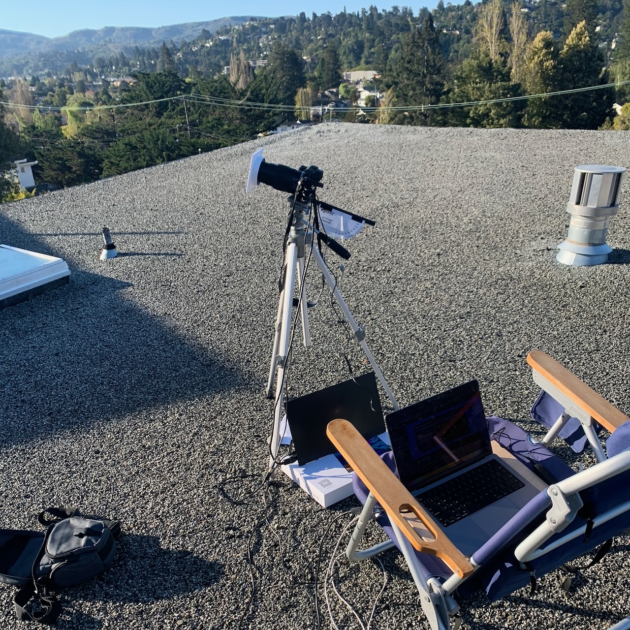 A camera on top of a roof for taking pictures of eclipses